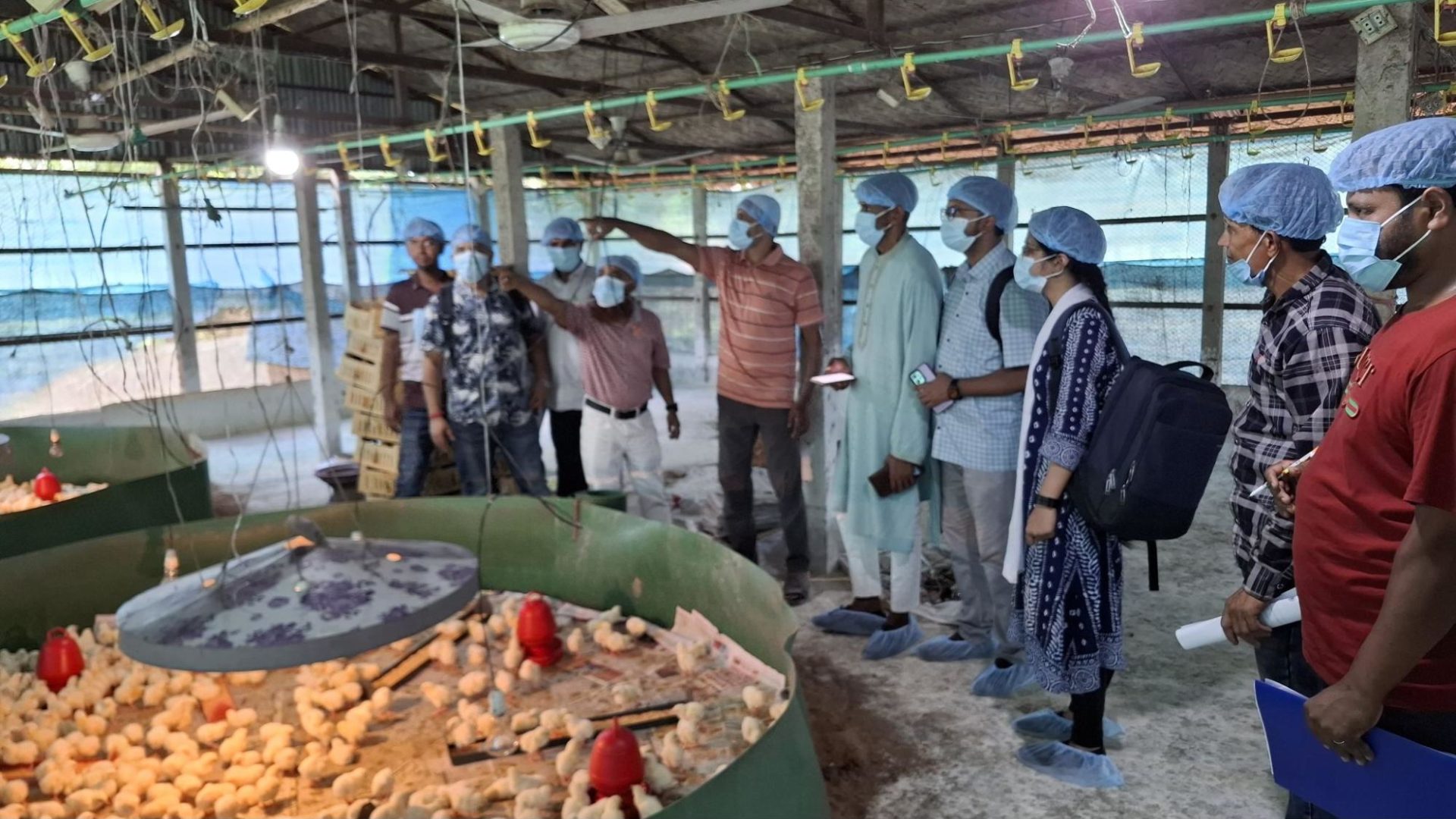 Farm visit at Sitakunda where participants assess biosecurity practices