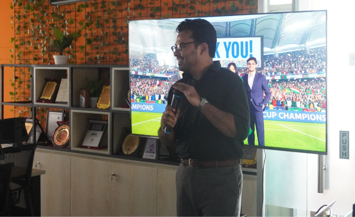 Israk Faruquee, presenting his part of the session "Building Markets Through Technology, Capital & Intelligence,"